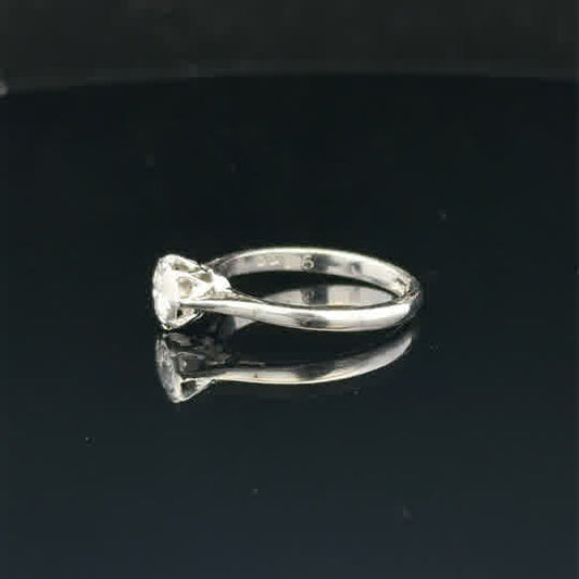 18ct white gold diamond ring size K with sparkling diamonds, showcasing a sleek and elegant jewelry design.