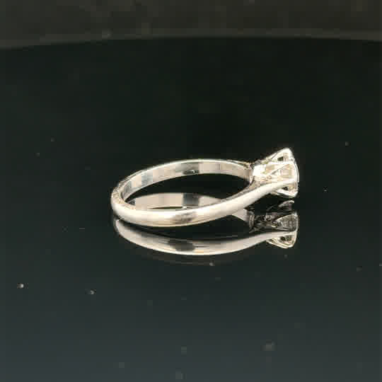 18ct white gold diamond ring size K with sparkling diamonds, showcasing elegant craftsmanship and a classic design.