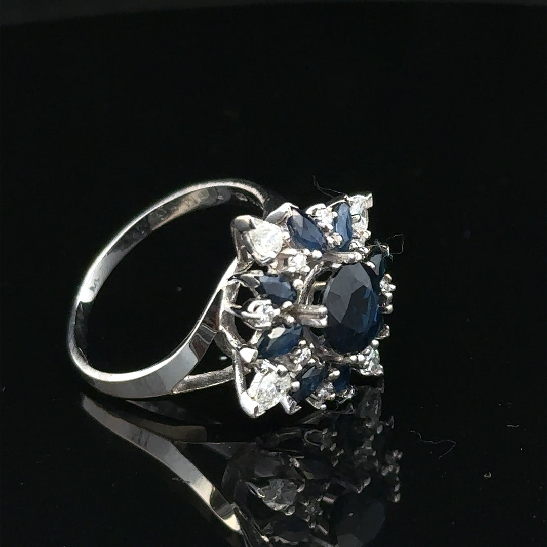 18ct white gold sapphire and diamond ring, size N 1/2, showcasing a sparkling sapphire centerpiece with diamond accents.