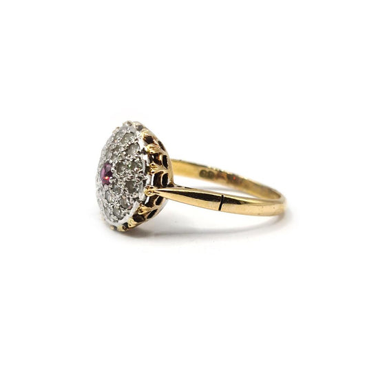 18ct yellow gold ruby and diamond cluster ring with 0.15 carat ruby and 0.60 carat diamonds, size Q, featuring a elegant design.