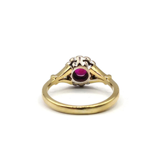 18ct yellow gold ring featuring a 0.33 carat ruby and 1/4 carat diamond, elegant jewelry with vibrant gemstones and gold setting.