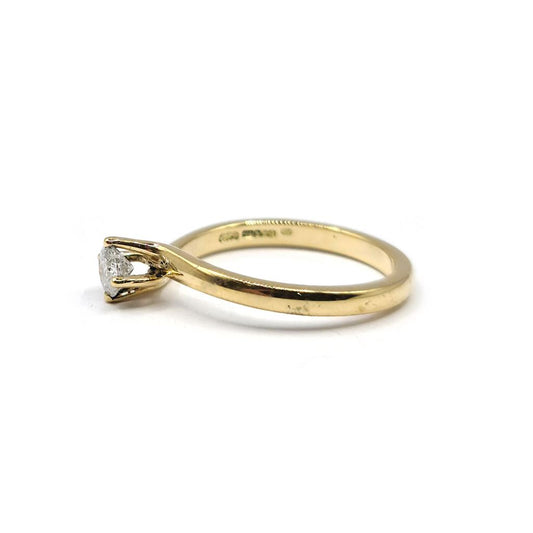 18ct yellow gold solitaire diamond ring with 0.35 carats and H color, featuring a sleek and elegant design.