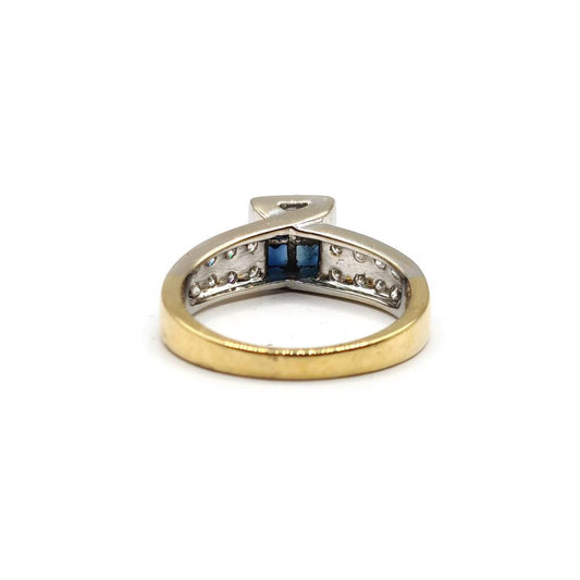 18ct yellow gold sapphire and diamond ring with size N, featuring a 0.60 carat sapphire and 0.70 carat diamonds design.