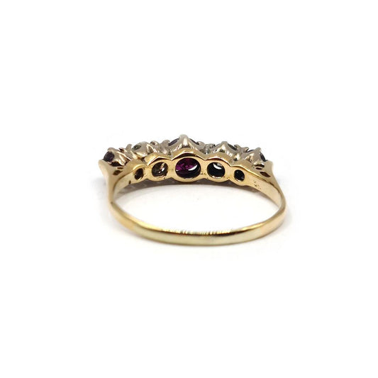18ct yellow gold ring featuring a 0.85 carat ruby and 0.44 carat diamond accents, elegant jewelry with vibrant gemstones.