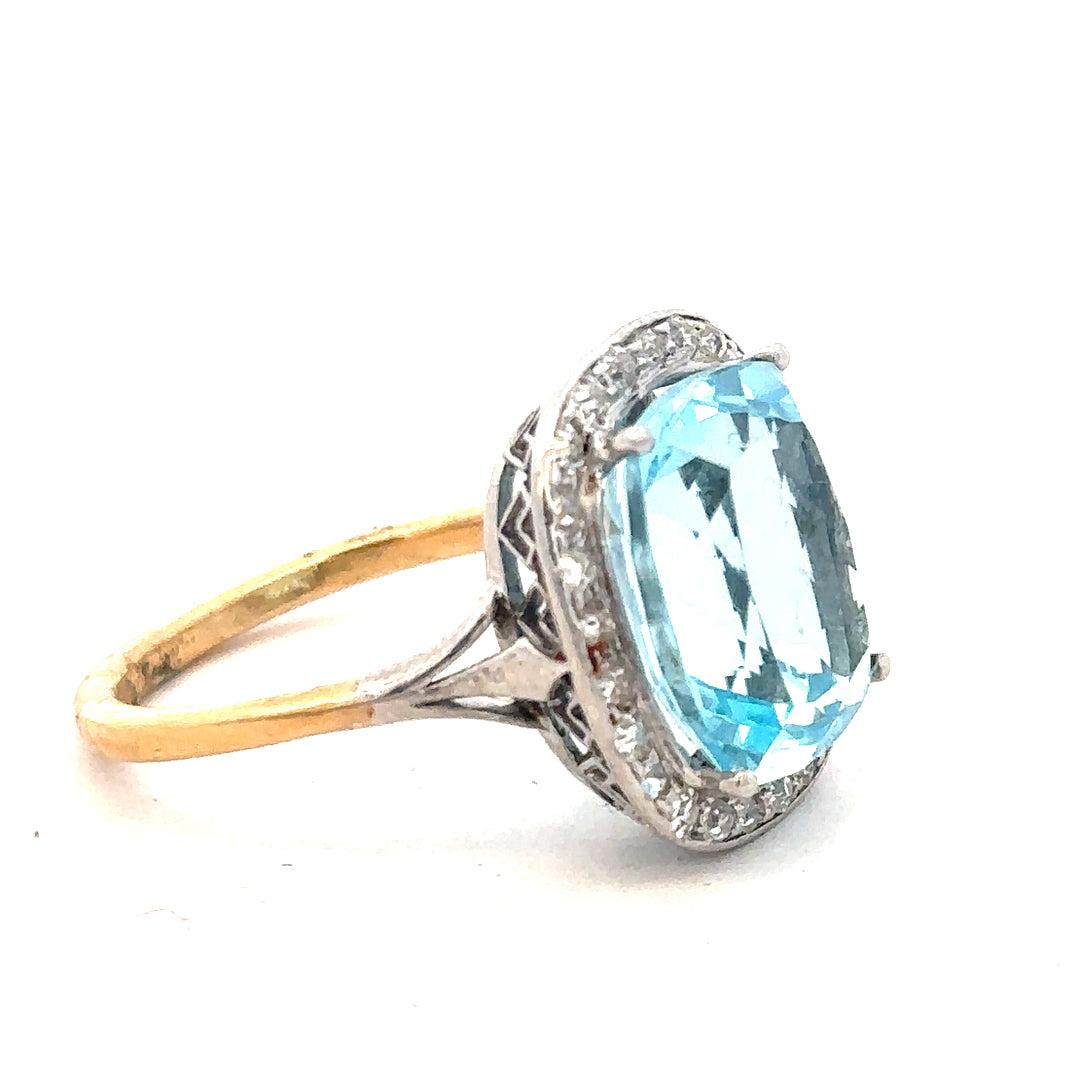 18ct yellow gold ring with a large 10.70 carat topaz and 0.40 carat diamond accents, size R, unbranded jewelry.