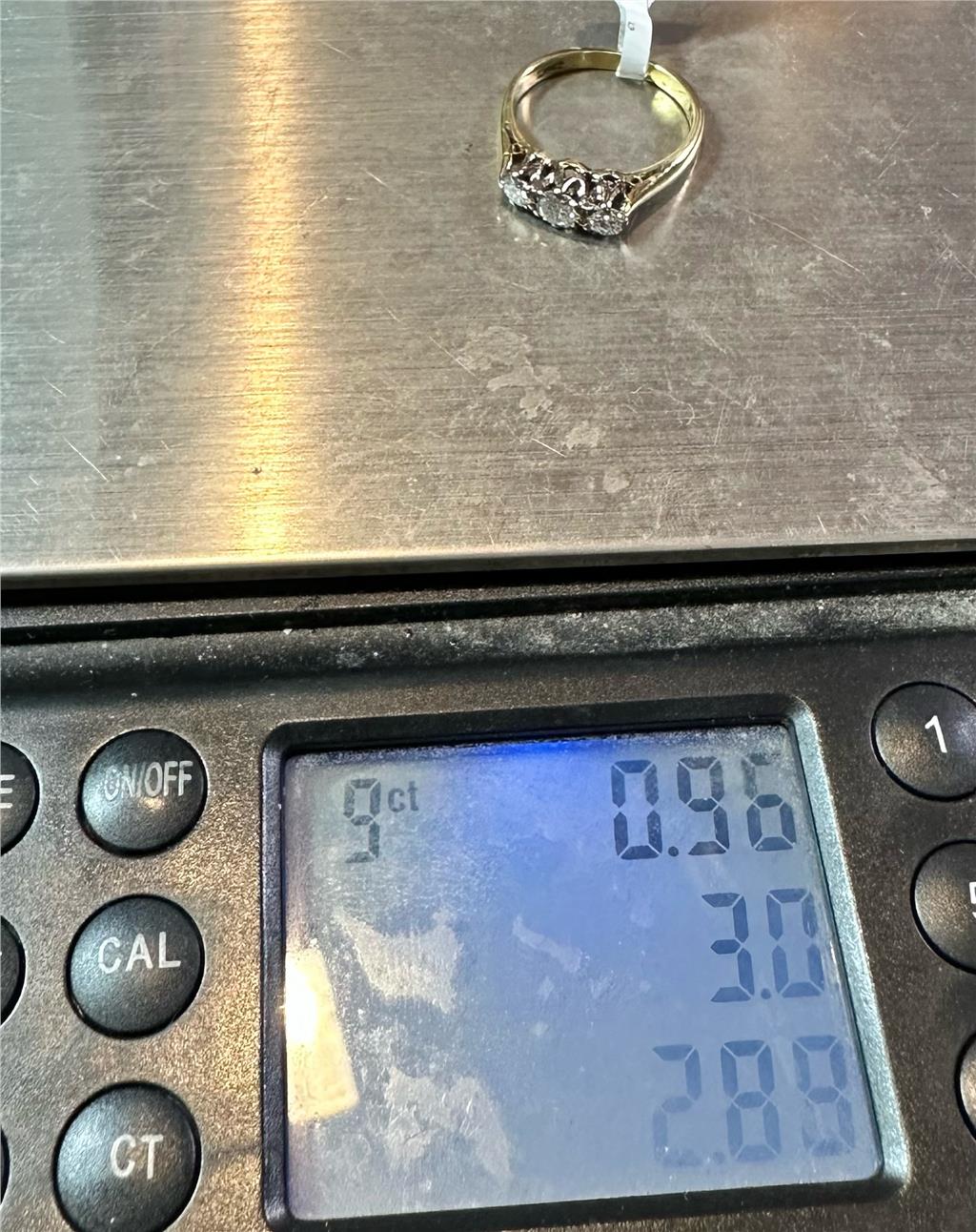 18ct yellow gold 3 diamond ring in size K, featuring a classic design with sparkling diamonds, unbranded jewelry accessory.