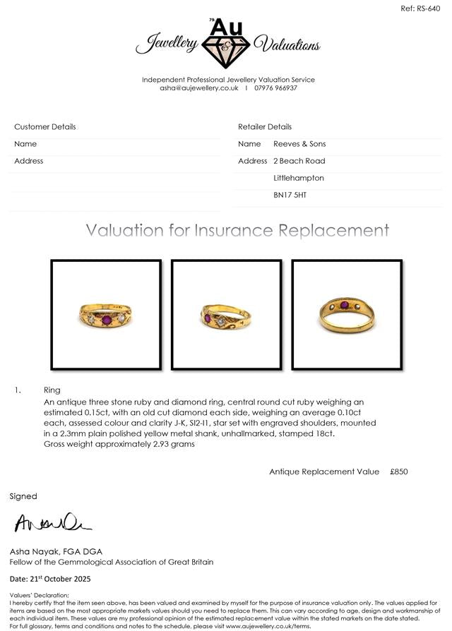 Antique 18ct yellow gold ring featuring a ruby and diamond accents, showcasing intricate vintage design and craftsmanship.