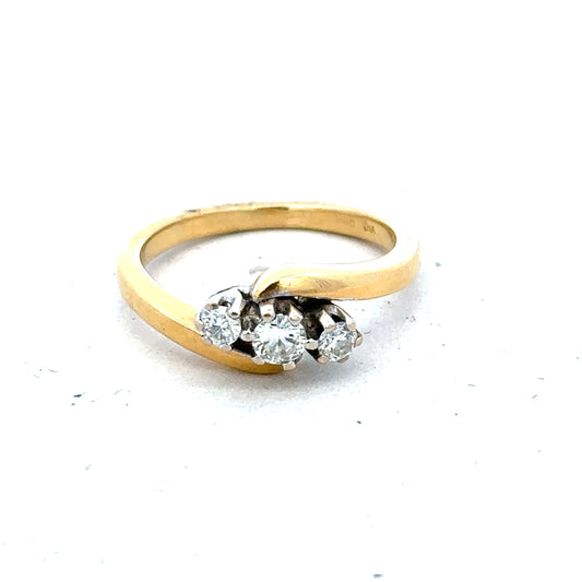 18ct yellow gold three diamond ring featuring a sleek band and sparkling stones, stylish and elegant jewelry piece.