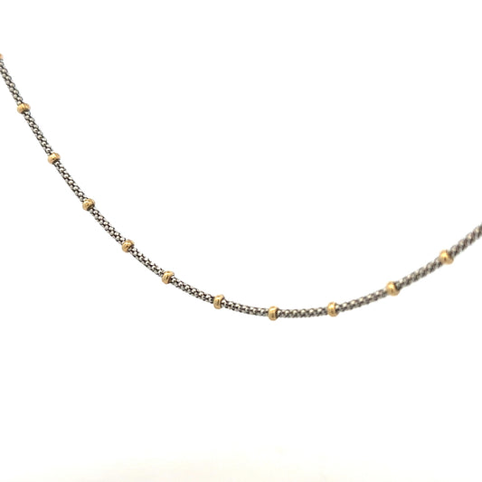 9ct gold chain weighing 5.6g, unbranded, with a classic link design, shown in a detailed product image.