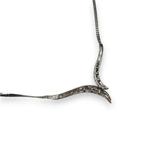 9ct white gold diamond necklace featuring a delicate chain and sparkling diamond pendant, elegant jewelry for special occasions.
