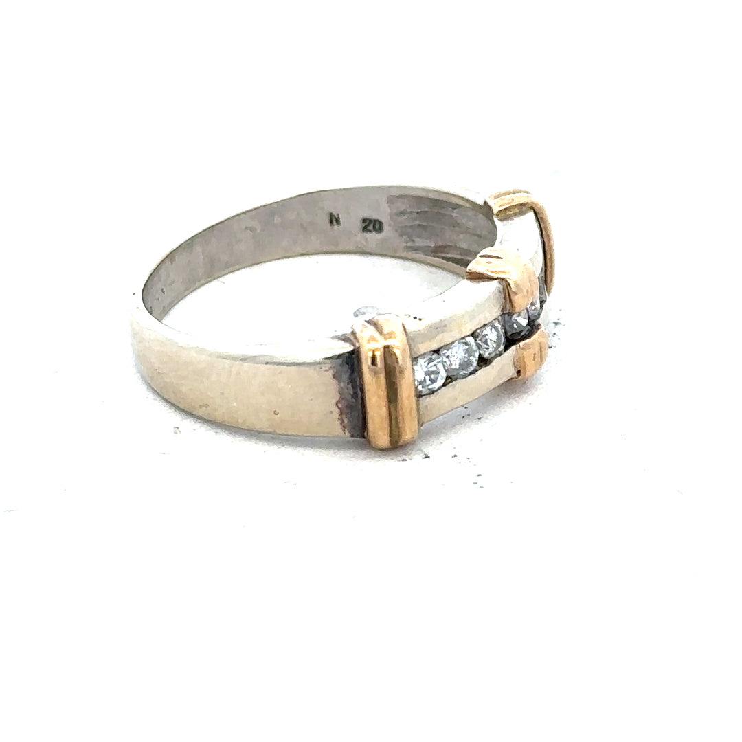 9ct white gold diamond ring with a sparkling central diamond and elegant band, unbranded jewelry piece.