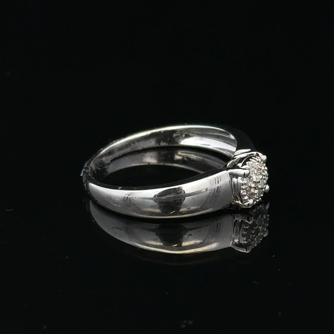9ct white gold diamond ring in size N1/2 with sparkling diamonds, showcasing elegant jewelry design.