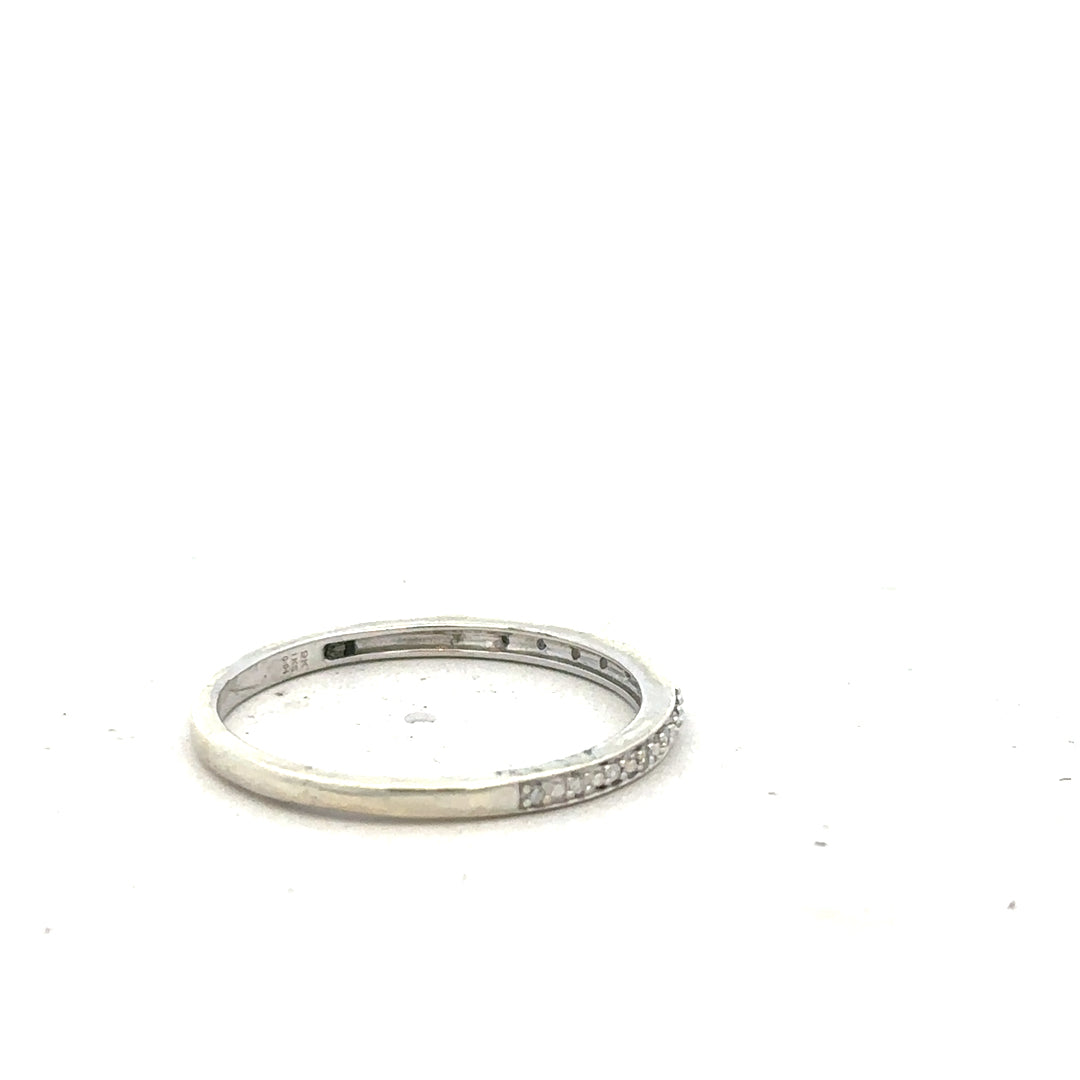 9ct white gold diamond ring in size S with sparkling diamonds, featuring a sleek, elegant design.