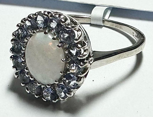 9ct white gold ring in size S with a smooth band, unbranded jewelry, shown on a plain background.