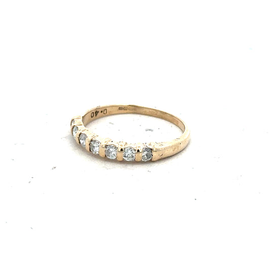 9ct yellow gold diamond ring with 0.40 carats, size N, featuring a sparkling central diamond and a classic band design.