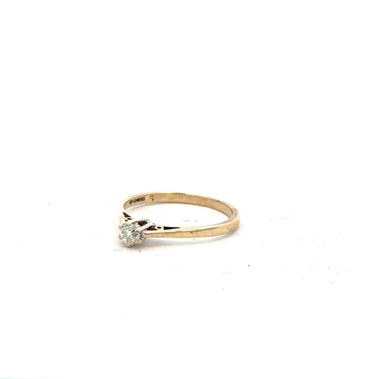 9ct yellow gold diamond ring with 20pts of diamonds in size N 1/2, showcasing a elegant jewelry design.