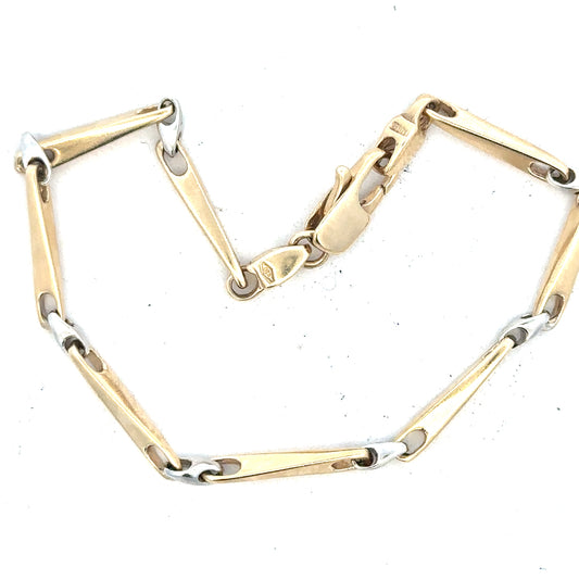 9ct yellow gold bracelet, unbranded, 8.9g, featuring a sleek, polished design, displayed on a neutral background.