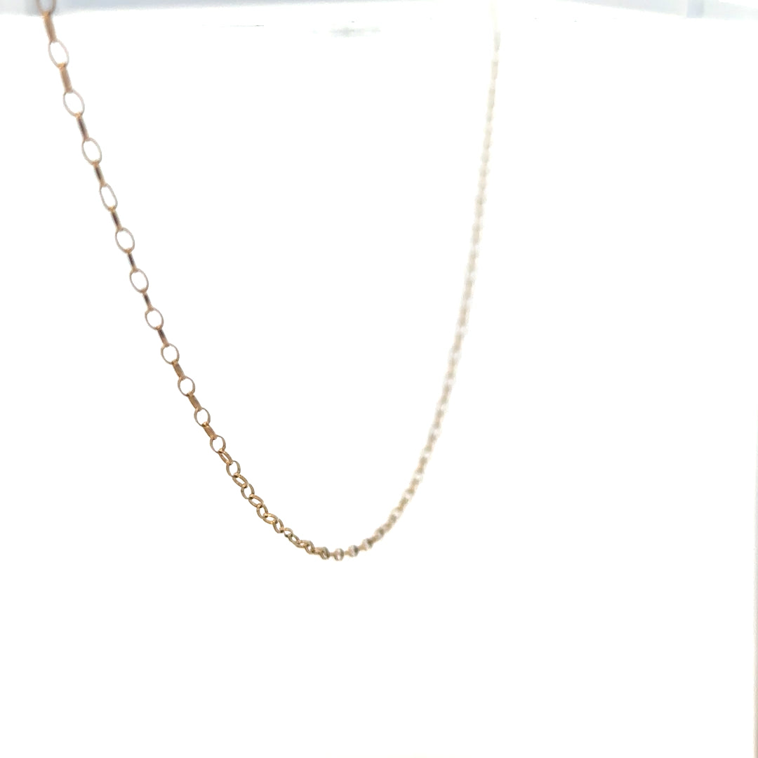 9ct yellow gold chain weighing 0.7g, simple and elegant jewelry piece with a smooth link design.