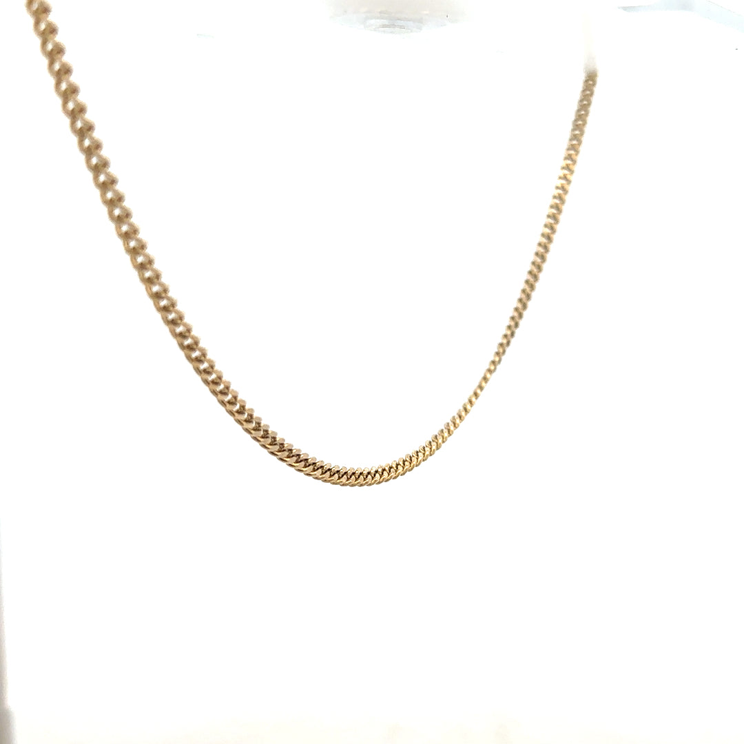 9ct yellow gold chain weighing 11g, unbranded, with a classic link design, shown in a close-up image.