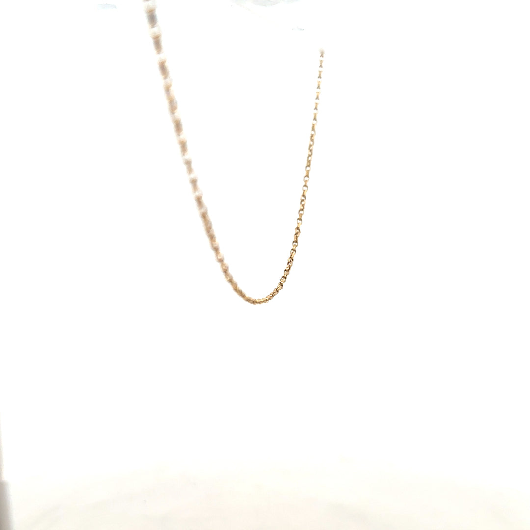 9ct yellow gold chain weighing 2.2g, unbranded jewelry with a classic link design, shown in a close-up image.