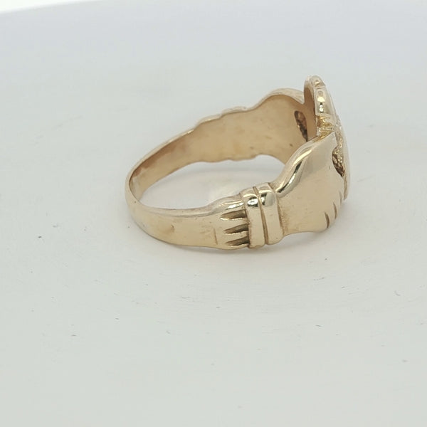 9ct yellow gold Claddagh ring with detailed heart and crown design, featuring traditional Irish symbolism.