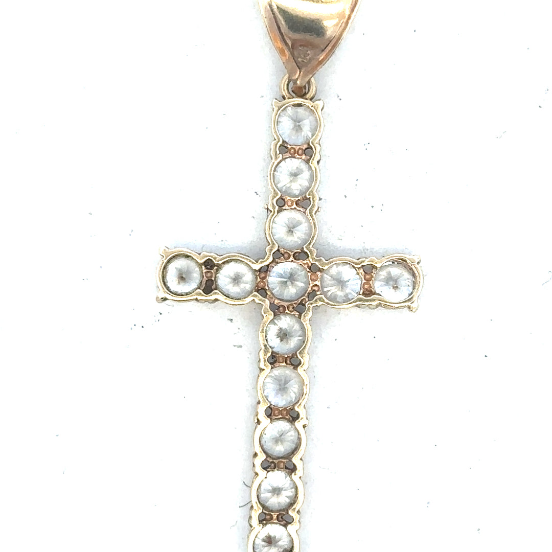 9ct yellow gold cross pendant, unbranded, weighing 5.1g, featuring a classic design with detailed craftsmanship.