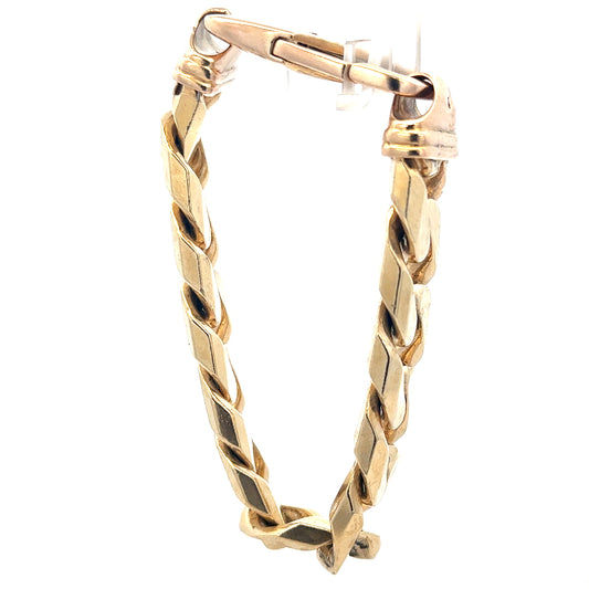 9ct yellow gold curb bracelet weighing 127g, featuring interlinked flat oval links, unbranded jewelry accessory.