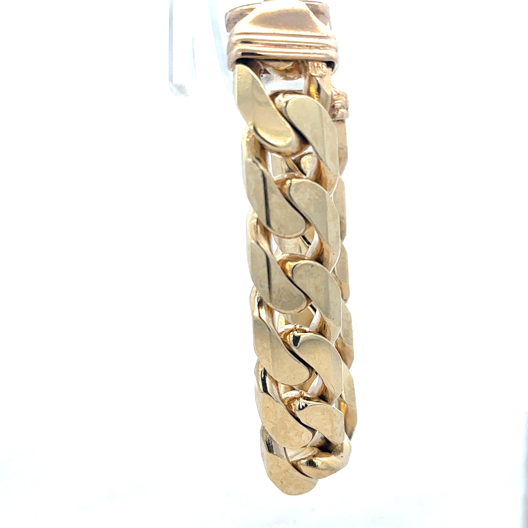 9ct yellow gold curb bracelet weighing 127g, unbranded jewelry with a classic chain design, shown in a close-up image.
