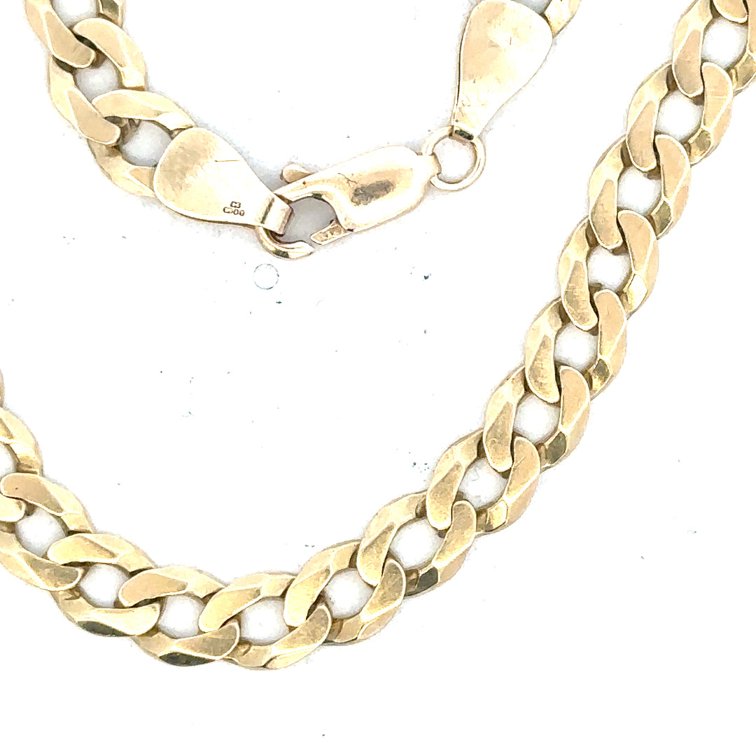 9ct yellow gold curb bracelet weighing 8.3g, featuring classic linked design, unbranded jewelry accessory.