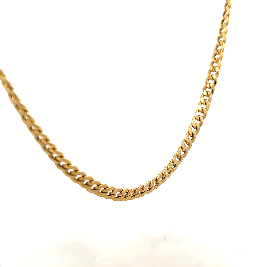 9ct yellow gold curb chain weighing 14.6g, close-up of the unbranded jewelry showing its links and polished finish.