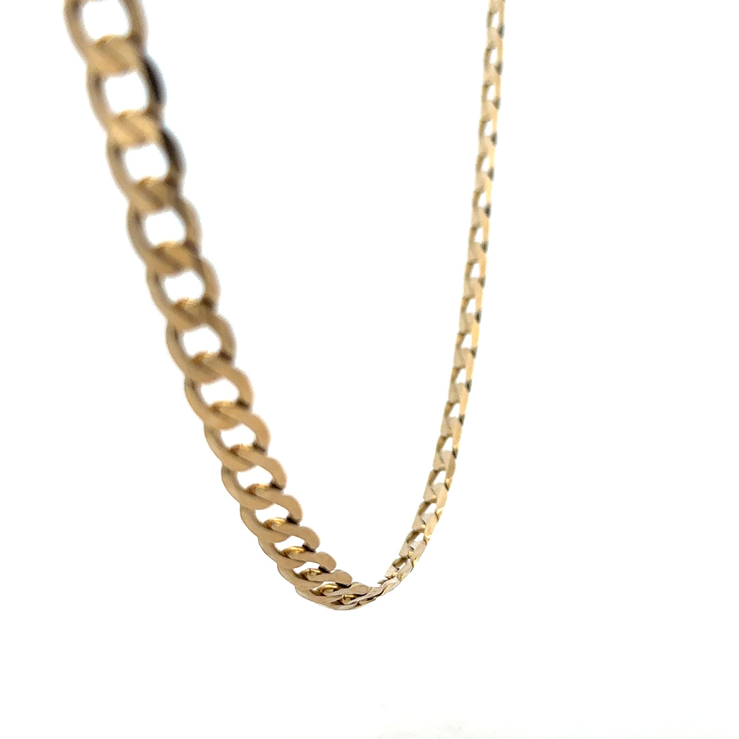 9ct yellow gold curb chain weighing 30.3g, featuring classic linked design, unbranded jewelry accessory.