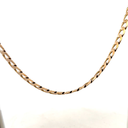 9ct yellow gold curb chain weighing 38.8g, featuring classic interlinked design, unbranded jewelry accessory.
