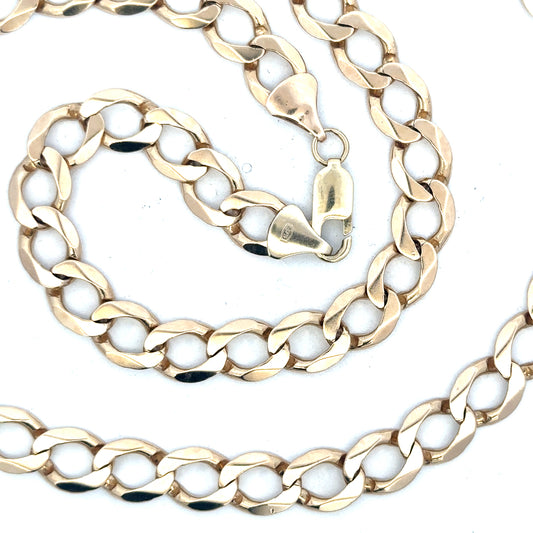 9ct yellow gold curb chain weighing 53.9g, unbranded jewelry with a classic design and polished finish.