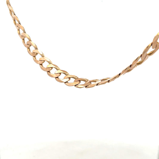 9ct yellow gold curb chain weighing 61.2g, displayed with detailed links and polished finish, unbranded jewelry accessory.