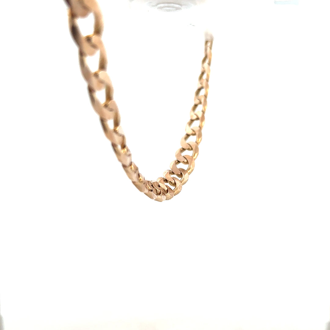 9ct yellow gold curb chain weighing 61.2g, showcasing its classic linked design and polished finish.
