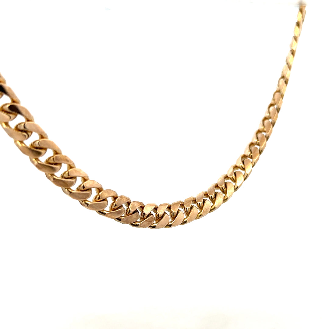9ct yellow gold curb chain weighing 61.4g, featuring a classic linked design, unbranded jewelry piece.