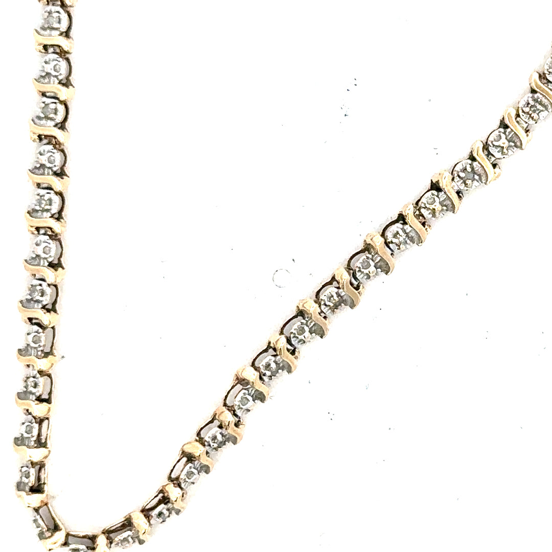 9ct yellow gold diamond bracelet weighing 5g, featuring sparkling diamonds and a delicate chain design.