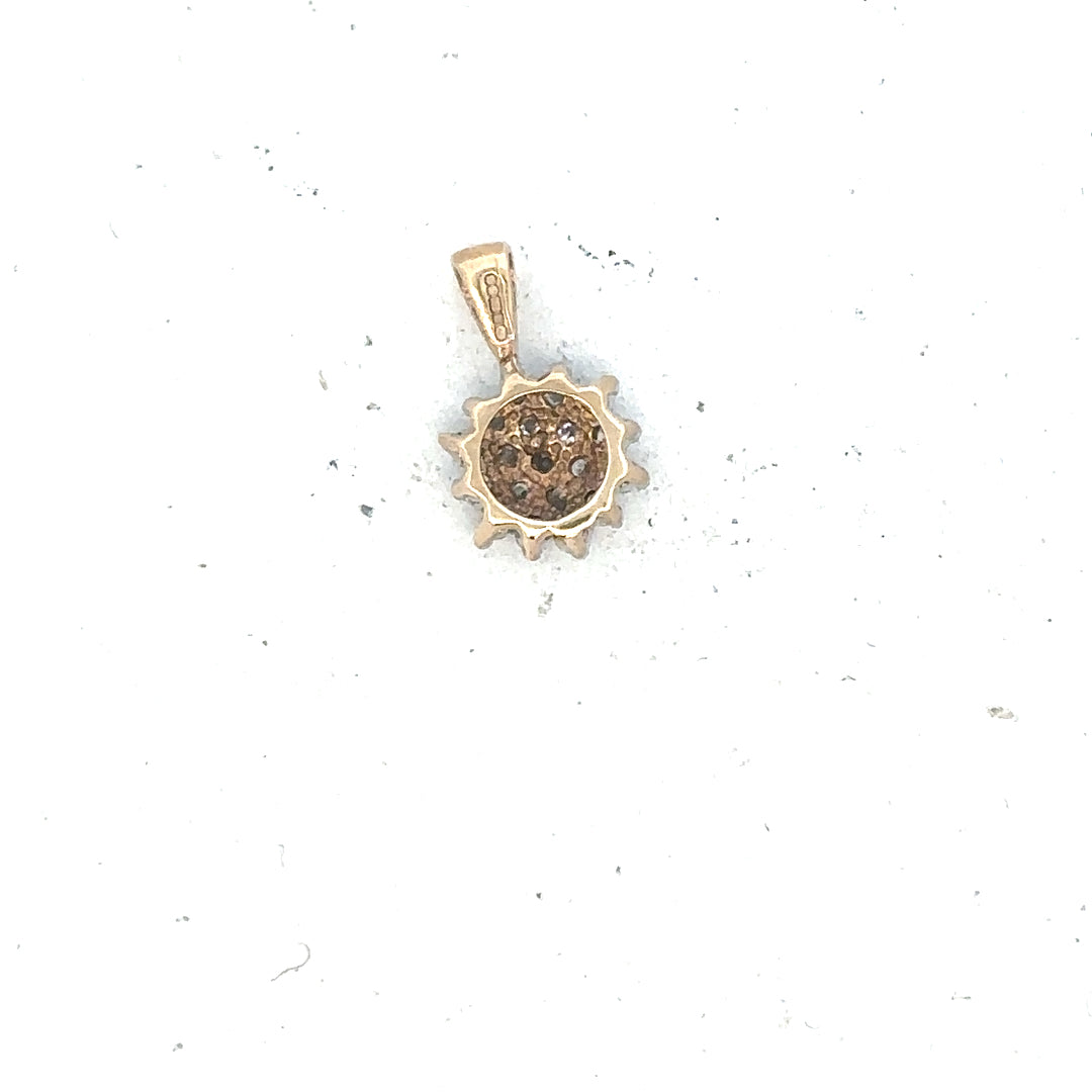 9ct yellow gold diamond pendant with delicate design, weighing 0.6g, showcasing sparkling diamonds on a fine chain.