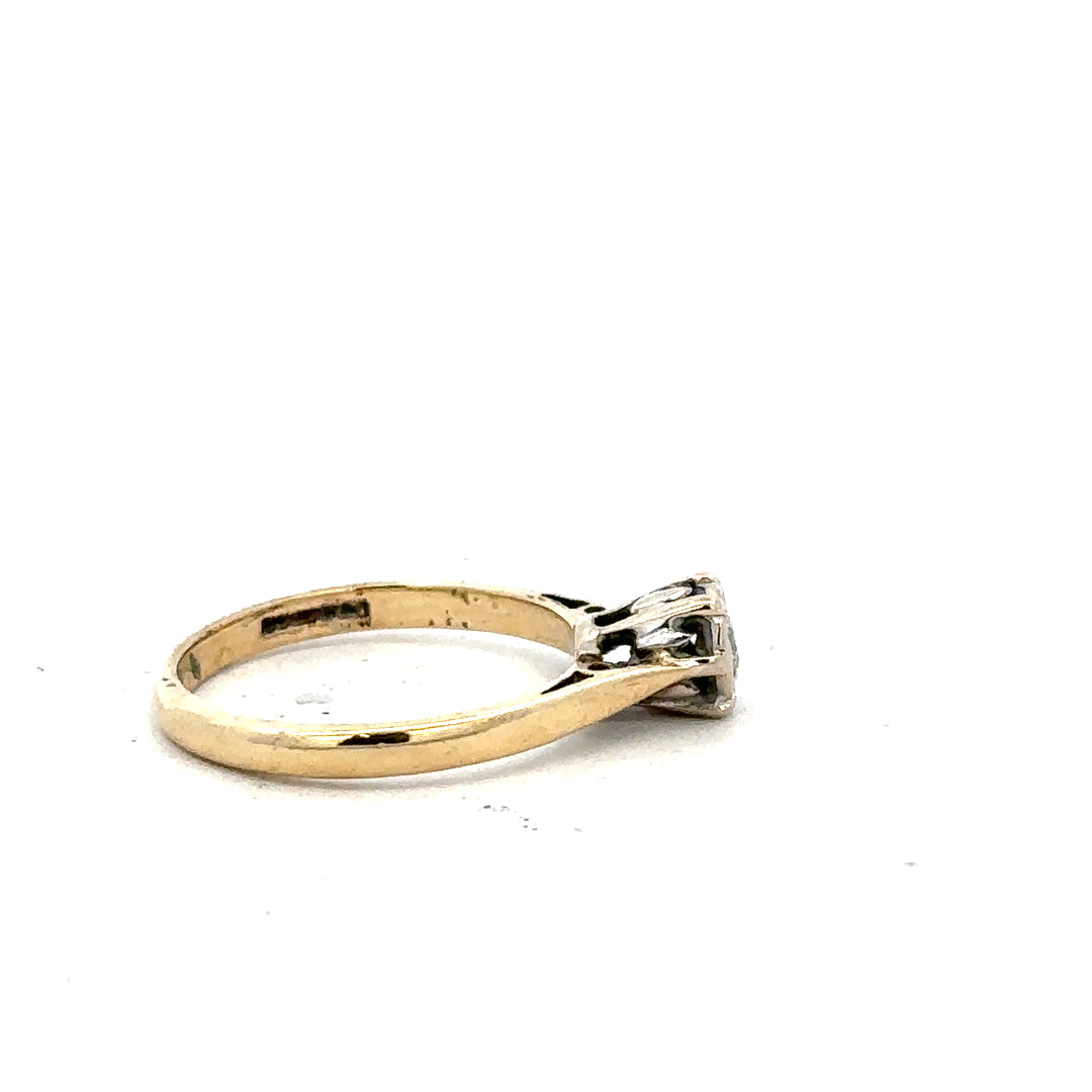 9ct yellow gold diamond ring in size K with sparkling diamonds, showcasing a delicate and elegant jewelry design.