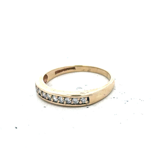9ct yellow gold diamond ring in size K1/2, featuring a sparkling central diamond and elegant design.