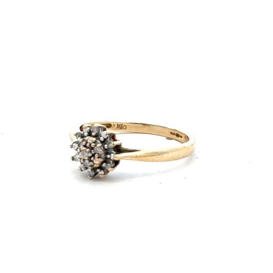 9ct yellow gold diamond ring in size M1/2 with sparkling diamonds, featuring an elegant band and classic design.