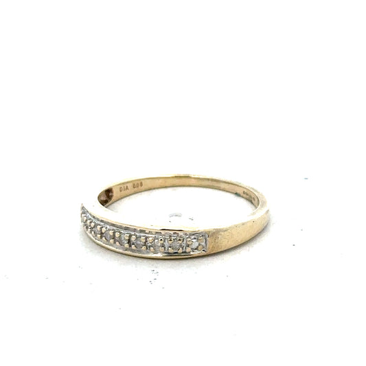 9ct yellow gold diamond ring in size P with sparkling diamonds, showcasing elegant craftsmanship and classic design.