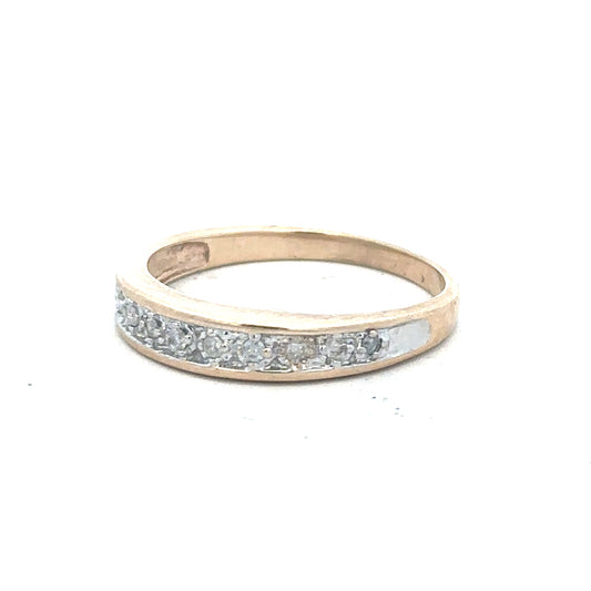 9ct yellow gold diamond ring in size Q with sparkling diamonds, featuring a sleek design.