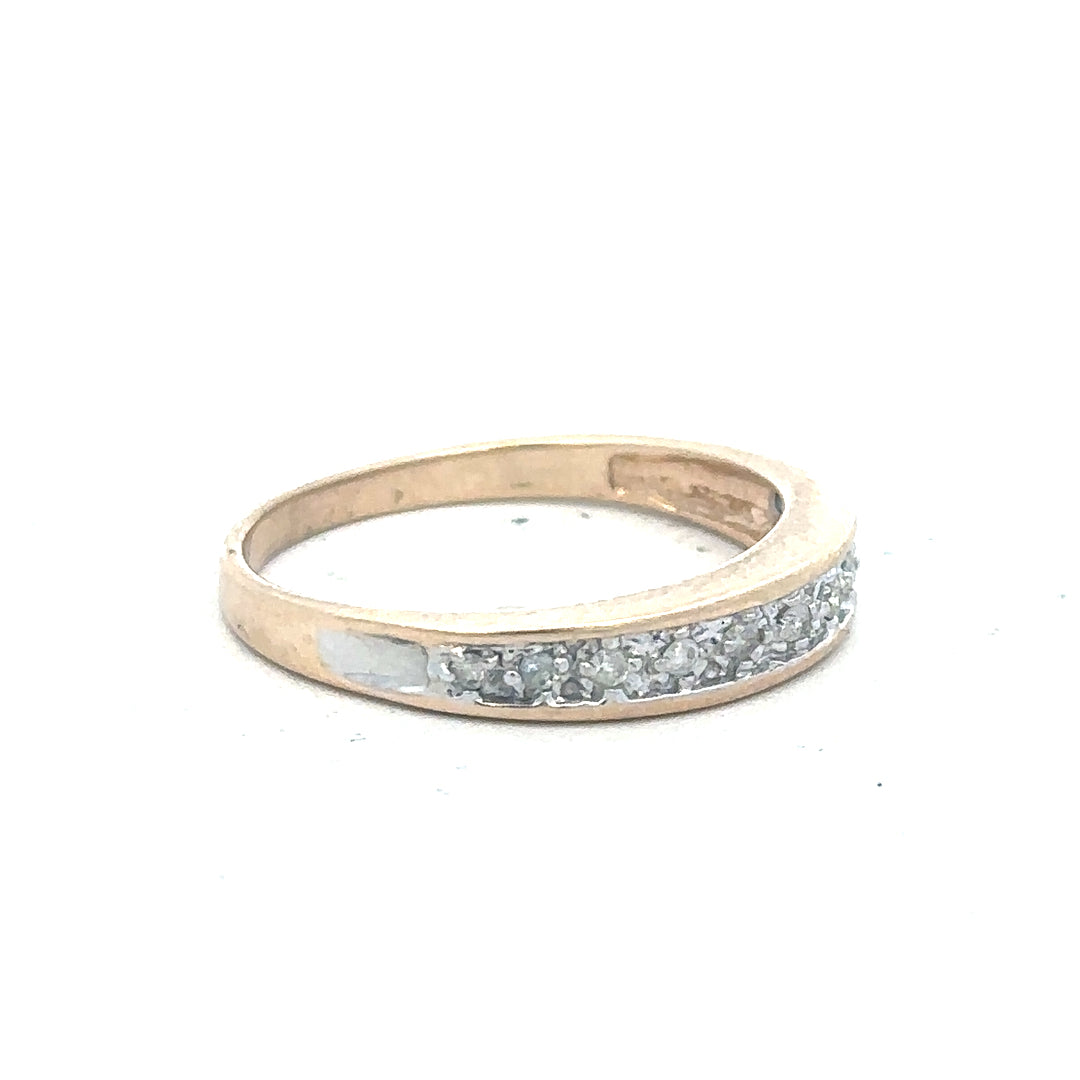 9ct yellow gold diamond ring in size Q with sparkling diamonds, unbranded jewelry displayed against a neutral background.