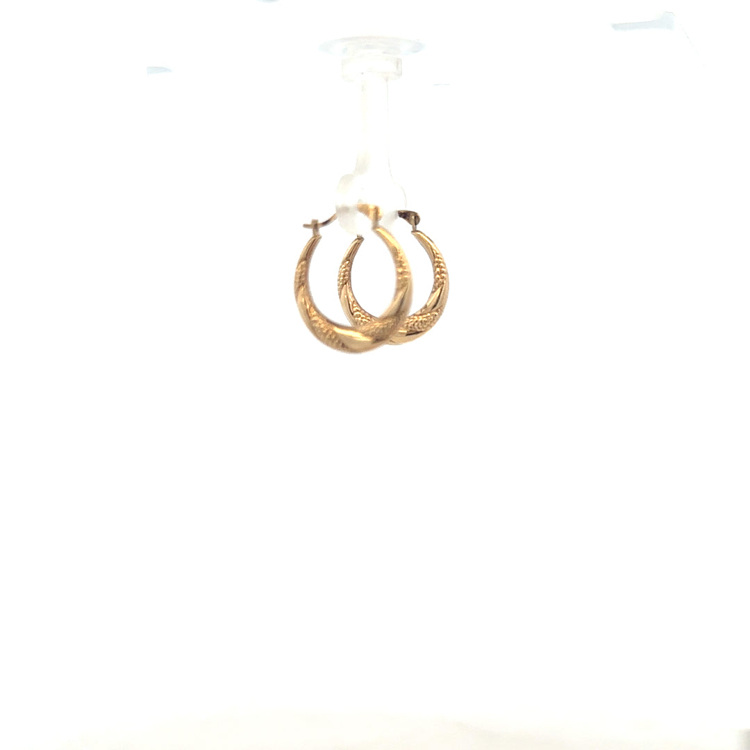 9ct yellow gold earrings weighing 0.8g, featuring a classic design, displayed on a plain background