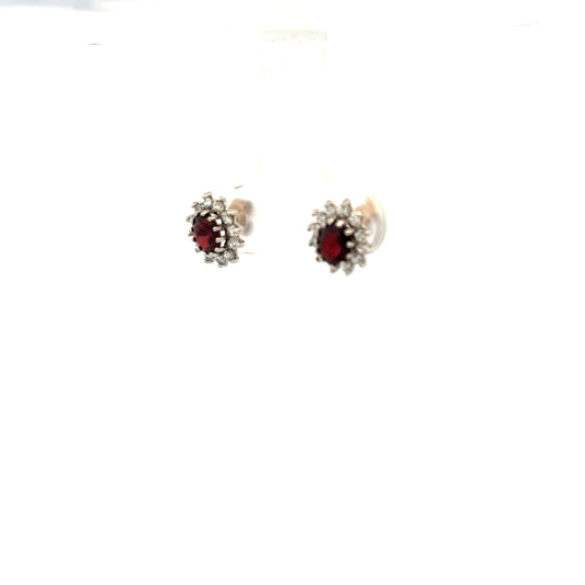 9ct yellow gold earrings weighing 1.2g, unbranded, with a simple, elegant design, displayed on a white background.