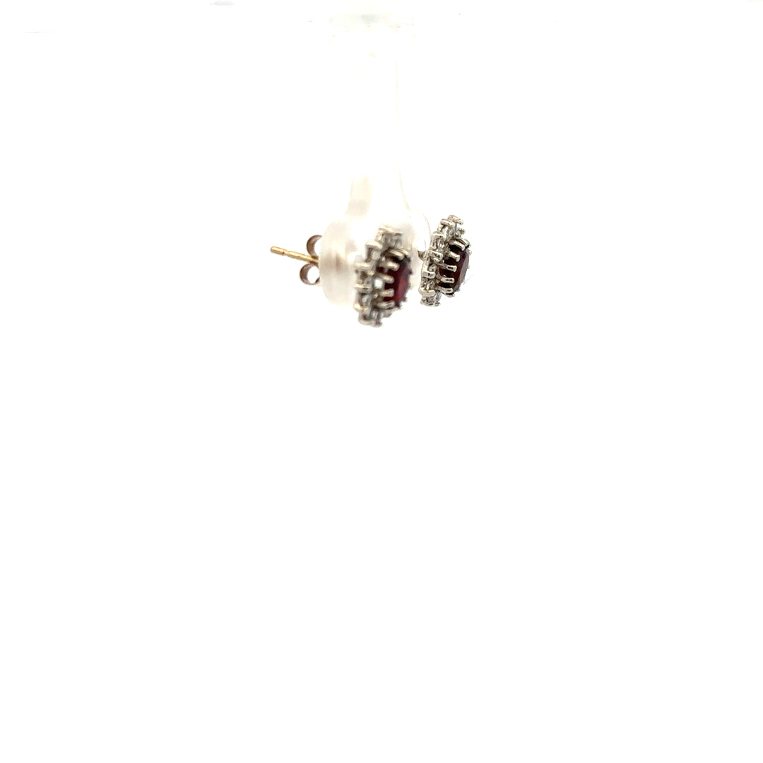 9ct yellow gold earrings weighing 1.2g, unbranded, with a classic design, shown in a clear image highlighting their polish and craftsmanship.