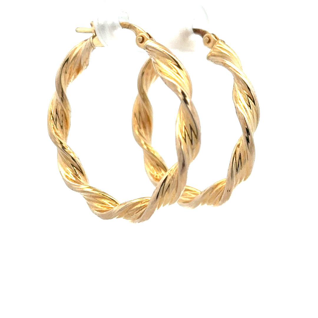 9ct yellow gold earrings weighing 1.6g, featuring a simple, elegant design perfect for everyday wear.