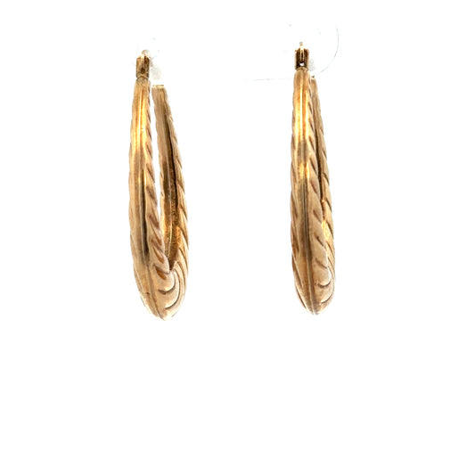 9ct yellow gold earrings weighing 1.6g, featuring classic design, shown from a front view with polished finish and secure clasps.