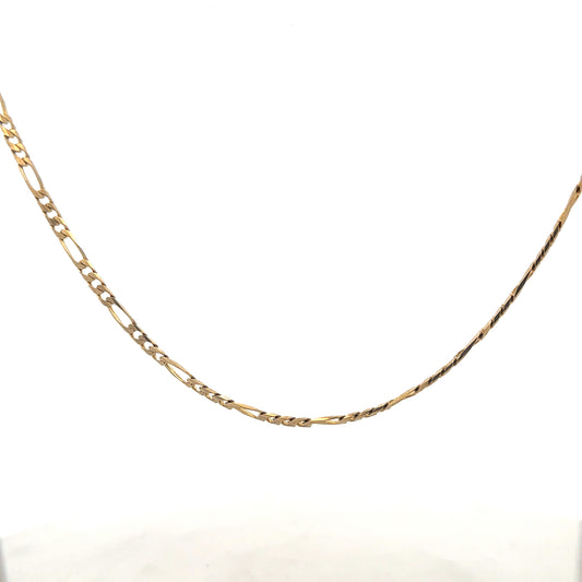 9ct yellow gold Figaro chain with a 7.2g weight, showcasing its intricate links and polished finish.